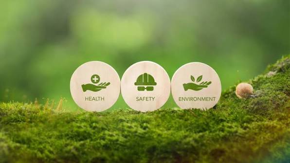 Health, Safety, and Environment icons on wooden discs